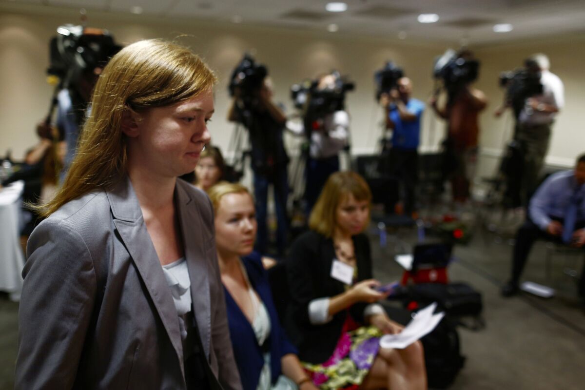 Abigail Fisher, who sued the University of Texas when she was not offered a spot at the university's flagship Austin campus in 2008, arrives for a news conference in Washington on June 24, 2013.