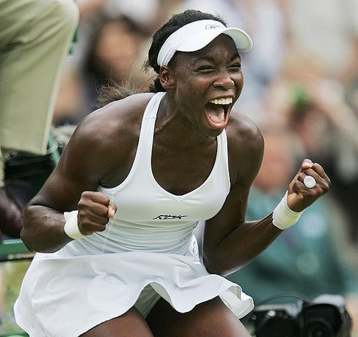 Venus Williams celebrates her win in the ladies singles final at Wimbledon in 2005.
