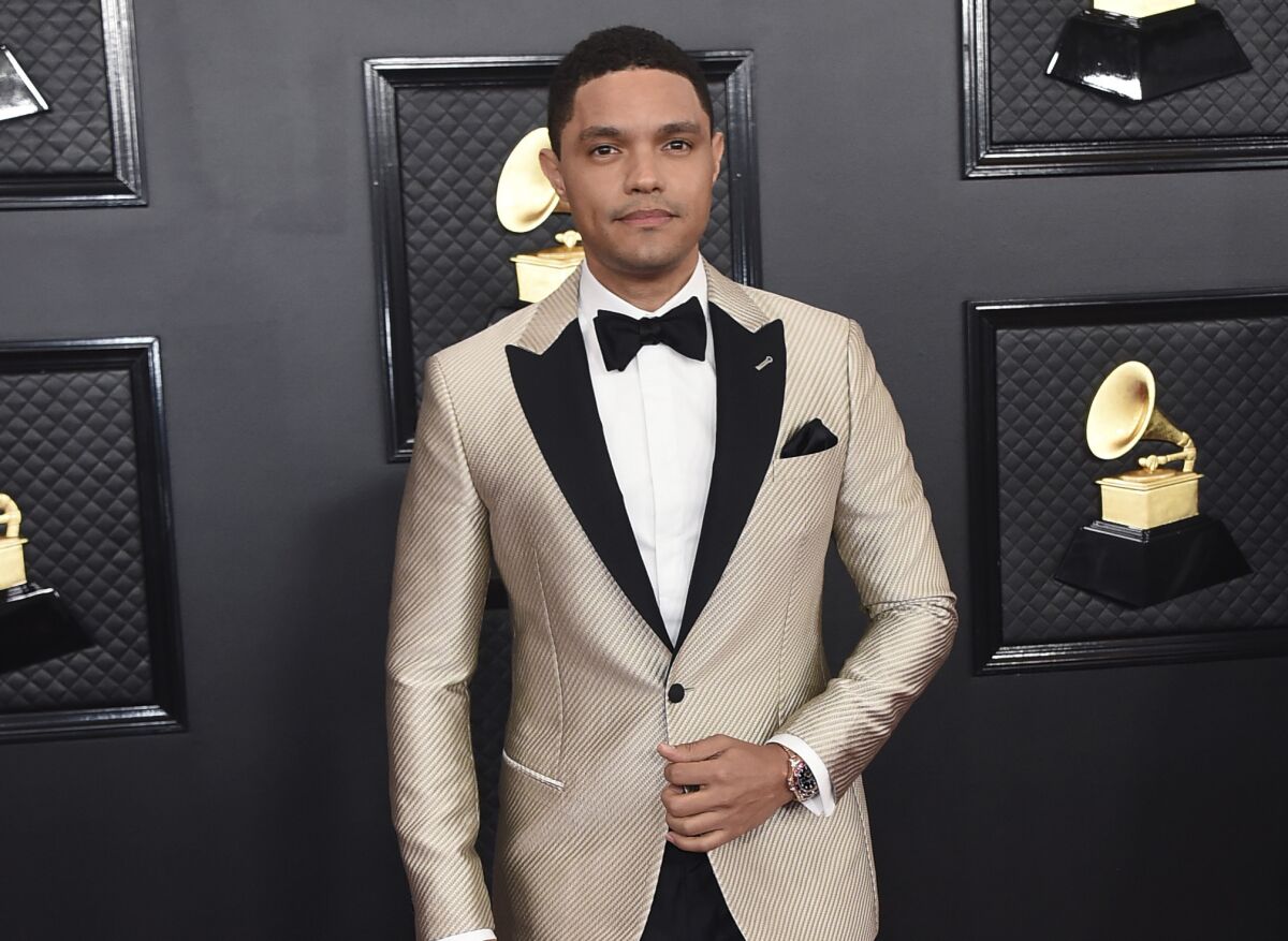 FILE - Trevor Noah arrives at the 62nd annual Grammy Awards in Los Angeles on Jan. 26, 2020.