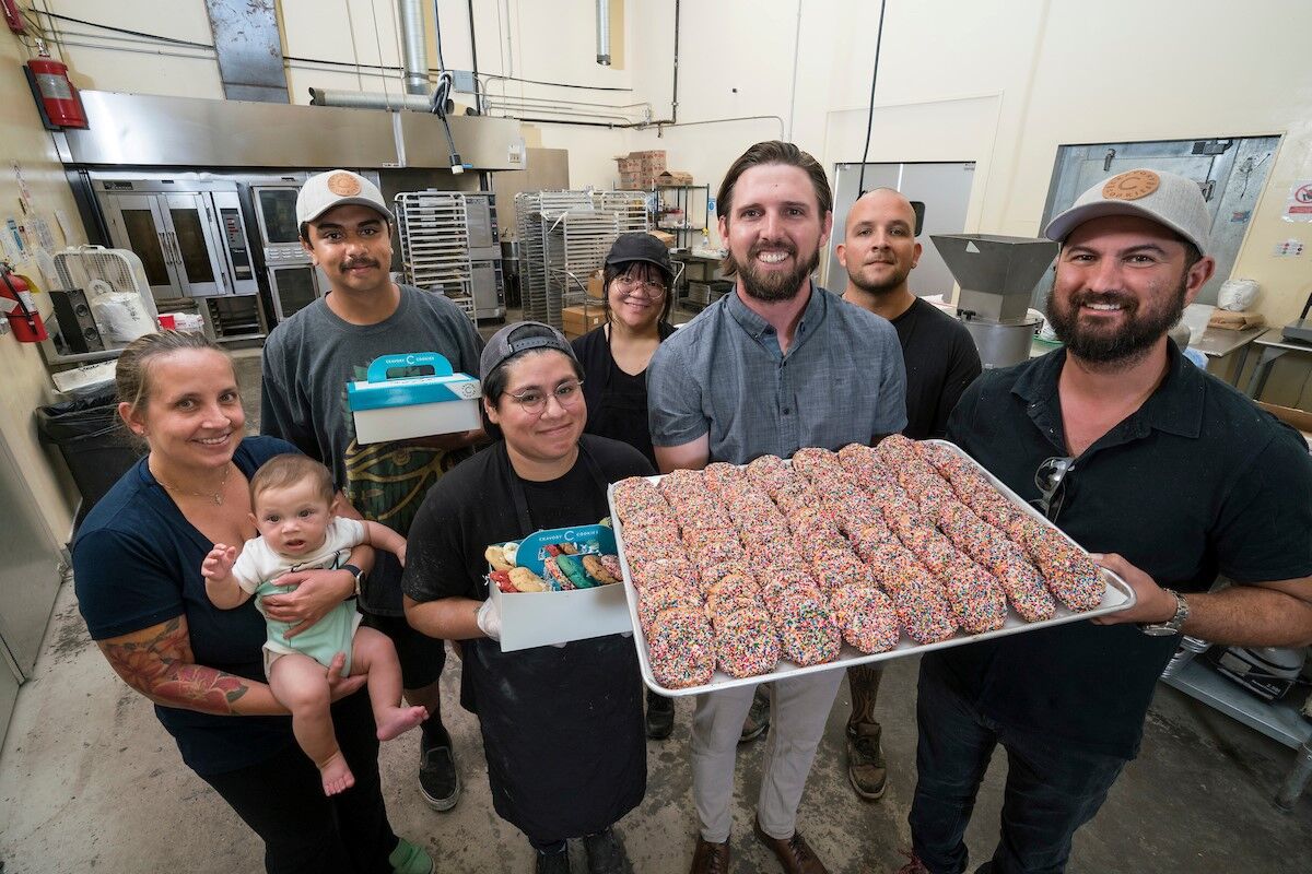 The Cravory team shows off the shop's unique cookies.