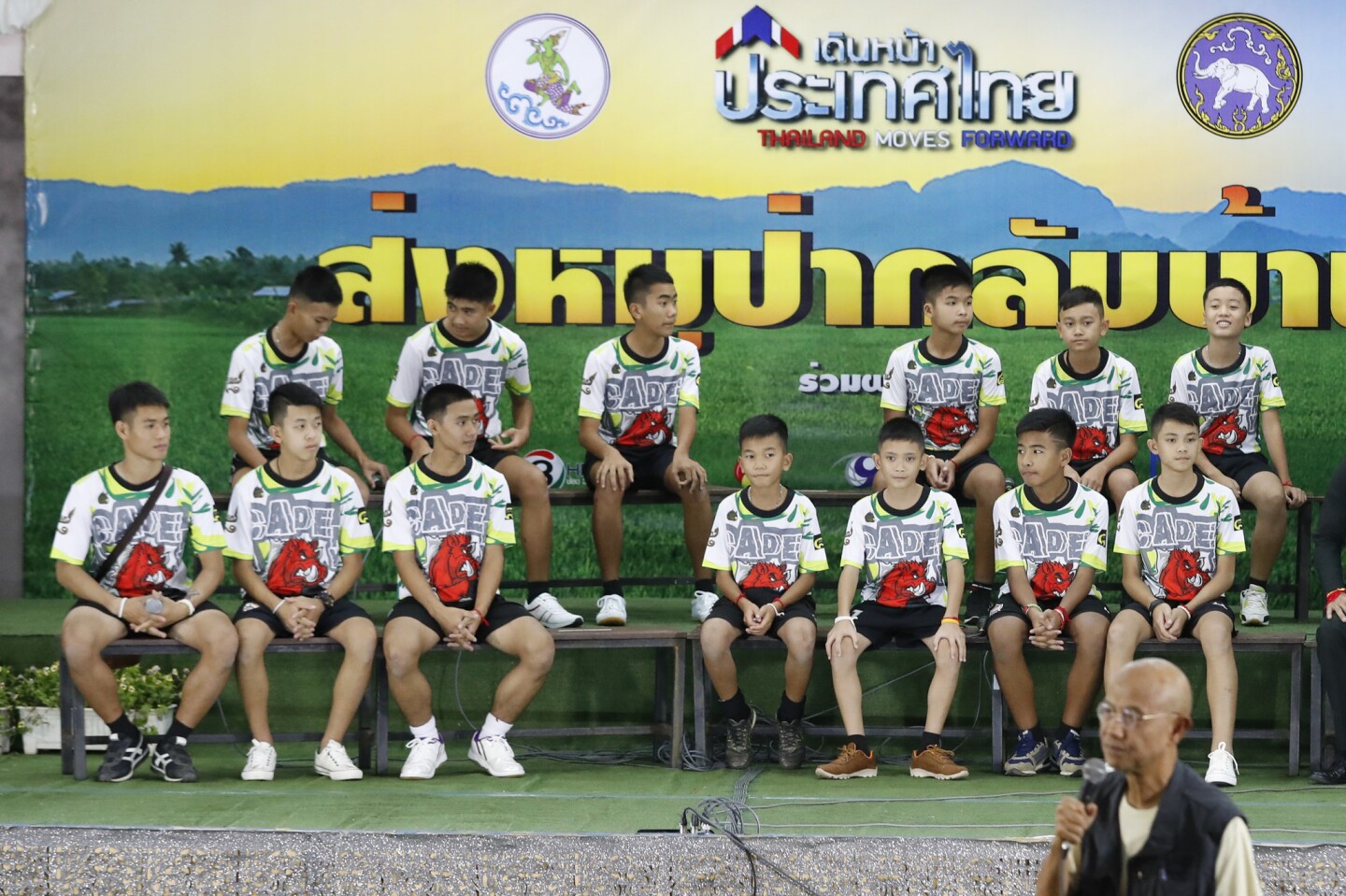 Members of the rescued soccer team and their coach sit during a press conference discussing their ordeal in the cave in Chiang Rai, northern Thailand, Wednesday, July 18, 2018.