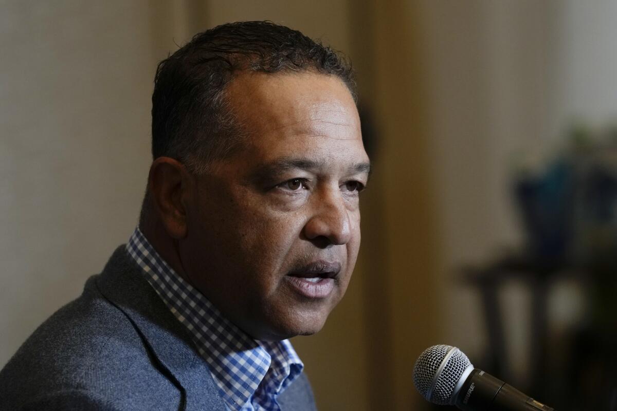 Dodgers manager Dave Roberts speaks during the Major League Baseball winter meetings in San Diego.