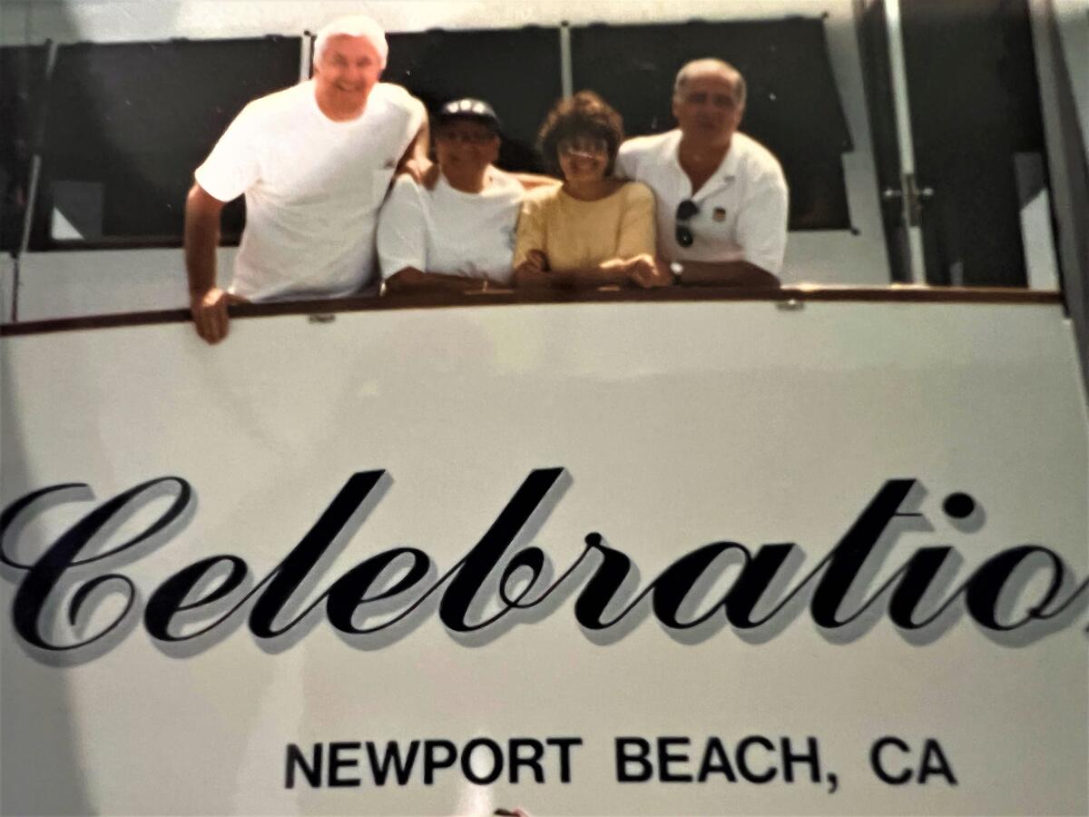 Bob Bennett, from left, with Marjie Bennett, Dolly Rich and Paul Rich in 1989 on the Bennett's 112-foot cruiser, Celebration.