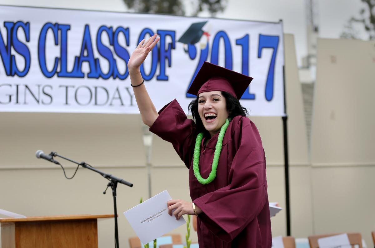 Metropolitan High School student Yesenia Ceballos, 18, celebrates her graduation in June.