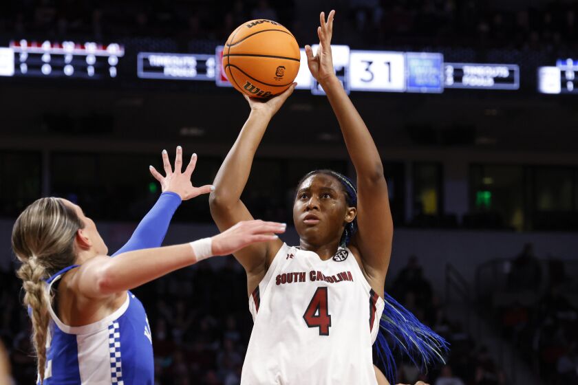 South Carolina forward Aliyah Boston (4) shoots over Kentucky guard Maddie Scherr, left, during the first half of an NCAA college basketball game in Columbia, S.C., Thursday, Feb. 2, 2023. (AP Photo/Nell Redmond)