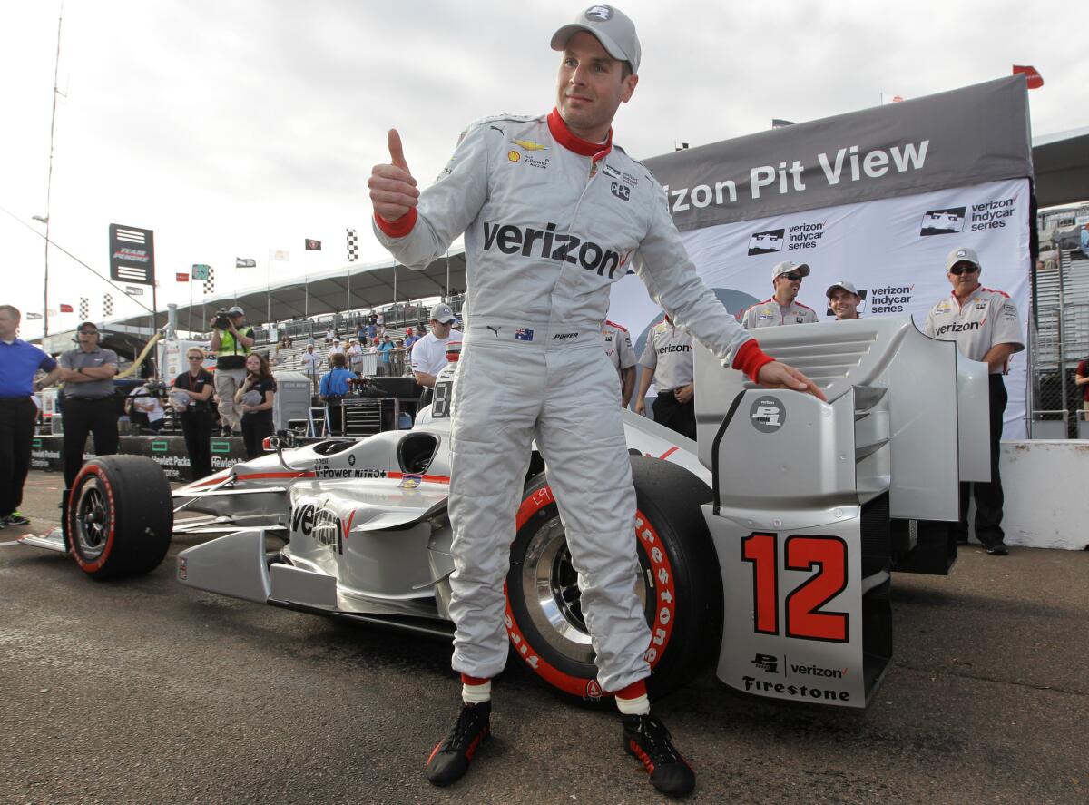 Will Power celebrates after winning pole position on March 12 for the IndyCar Firestone Grand Prix of St. Petersburg.