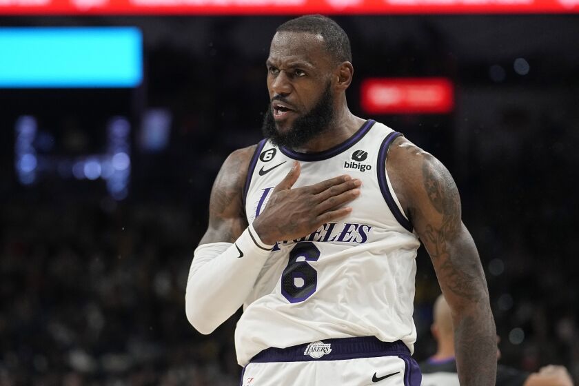 Los Angeles Lakers forward LeBron James (6) celebrates a score against the San Antonio Spurs during the second half of an NBA basketball game in San Antonio, Saturday, Nov. 26, 2022. (AP Photo/Eric Gay)