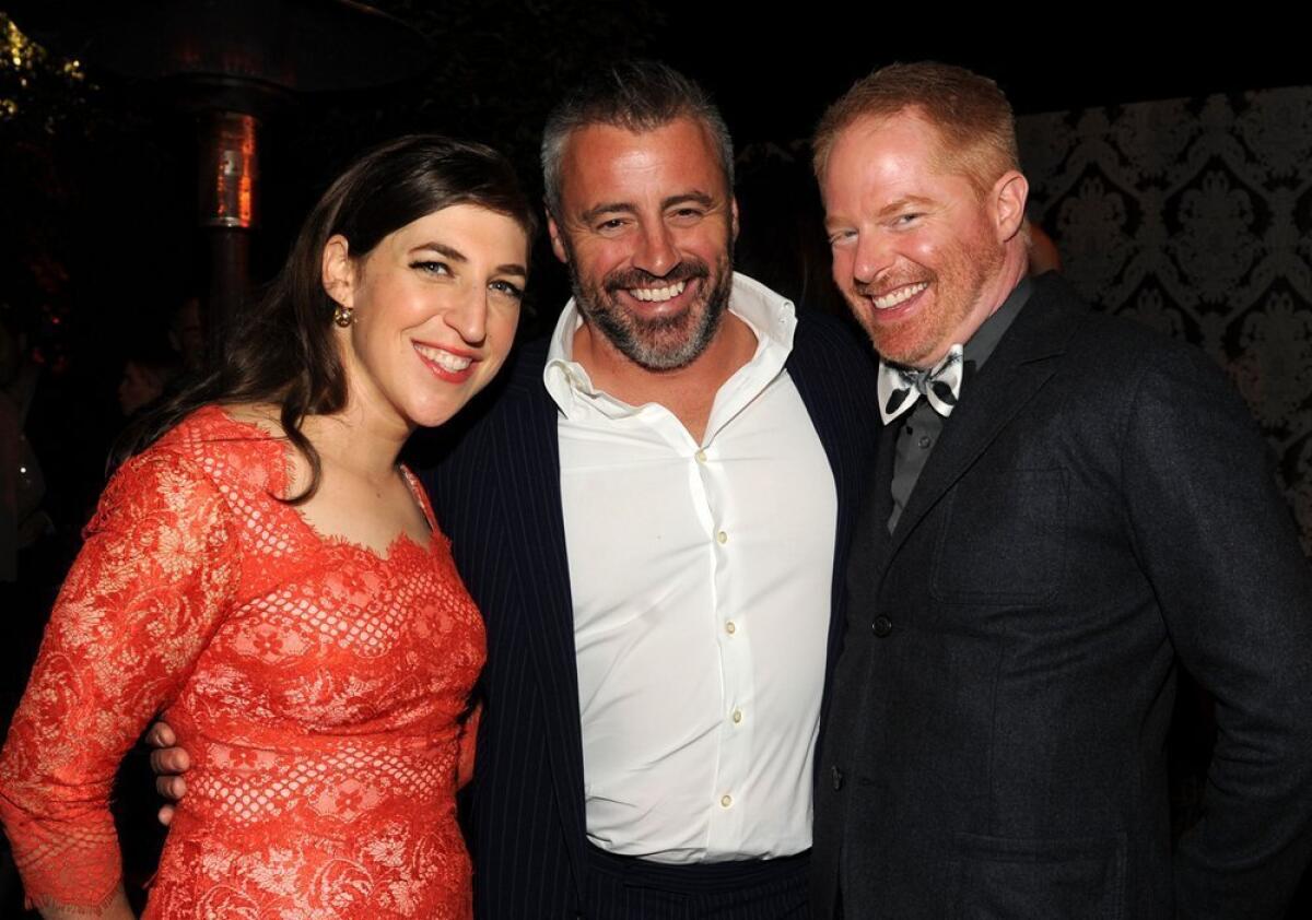 From left, Mayim Bialik, Matt LeBlanc and Jesse Tyler Ferguson pose for a photo at a reception for Emmy-nominated performers Friday in West Hollywood.