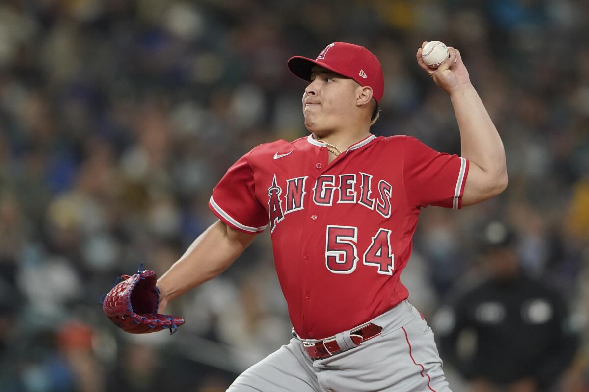 Angels left-hander José Suarez throws against the Seattle Mariners on Oct. 1, 2021, in Seattle. 