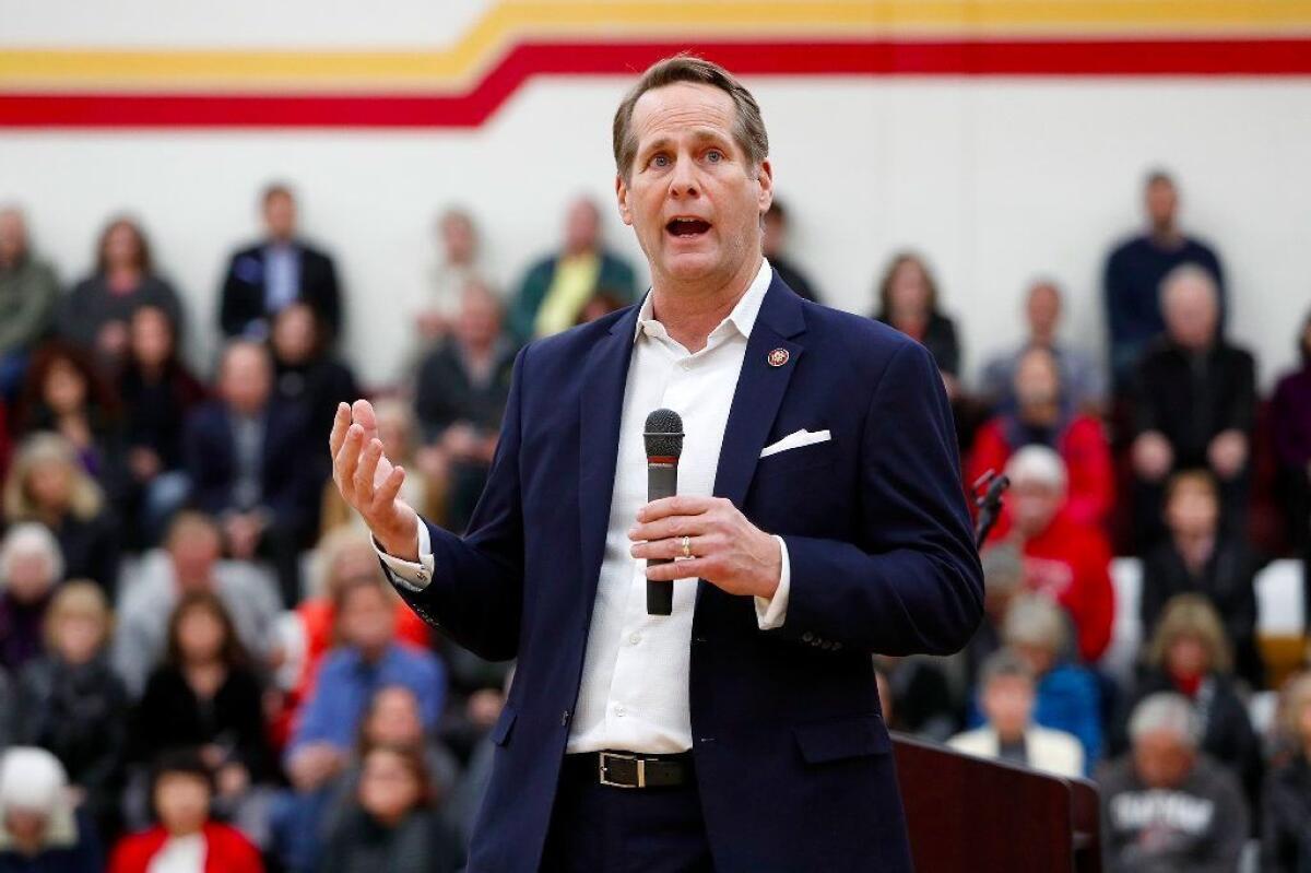 Rep. Harley Rouda (D-Laguna Beach) addresses his constituents during his first district town hall meeting in the gym at Estancia High School in Costa Mesa on Tuesday, February 19, 2019.