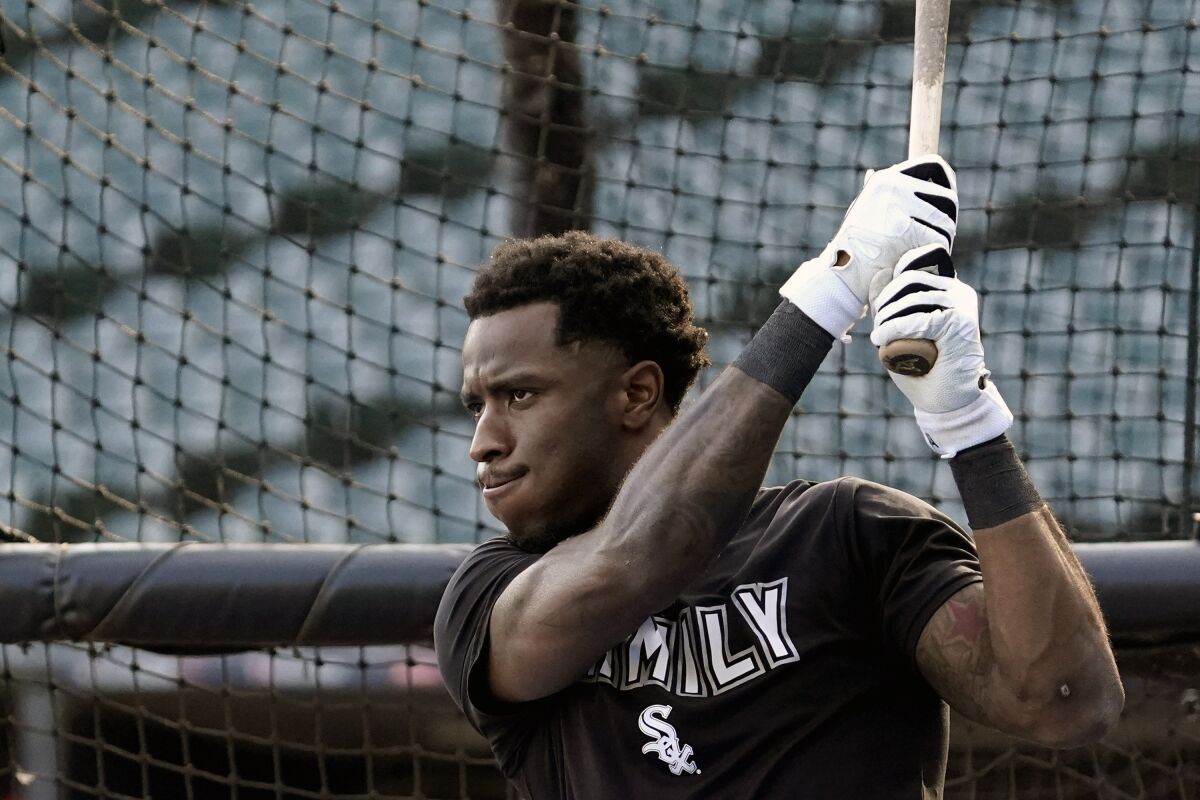 Chicago White Sox's Tim Anderson warms up during a baseball workout for the American League Divisions Series, Saturday, Oct. 9, 2021, in Chicago. The White Sox host the Houston Astros in Game 3 on Sunday.(AP Photo/Nam Y. Huh)
