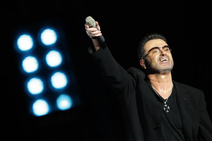 Legendary pop singer George Michael performs at the Zayed Sports City stadium in Abu Dhabi on Dec. 1, 2008.