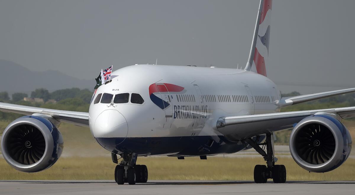 British Airways operates up to 850 flights a day. A British Airways plane is shown.