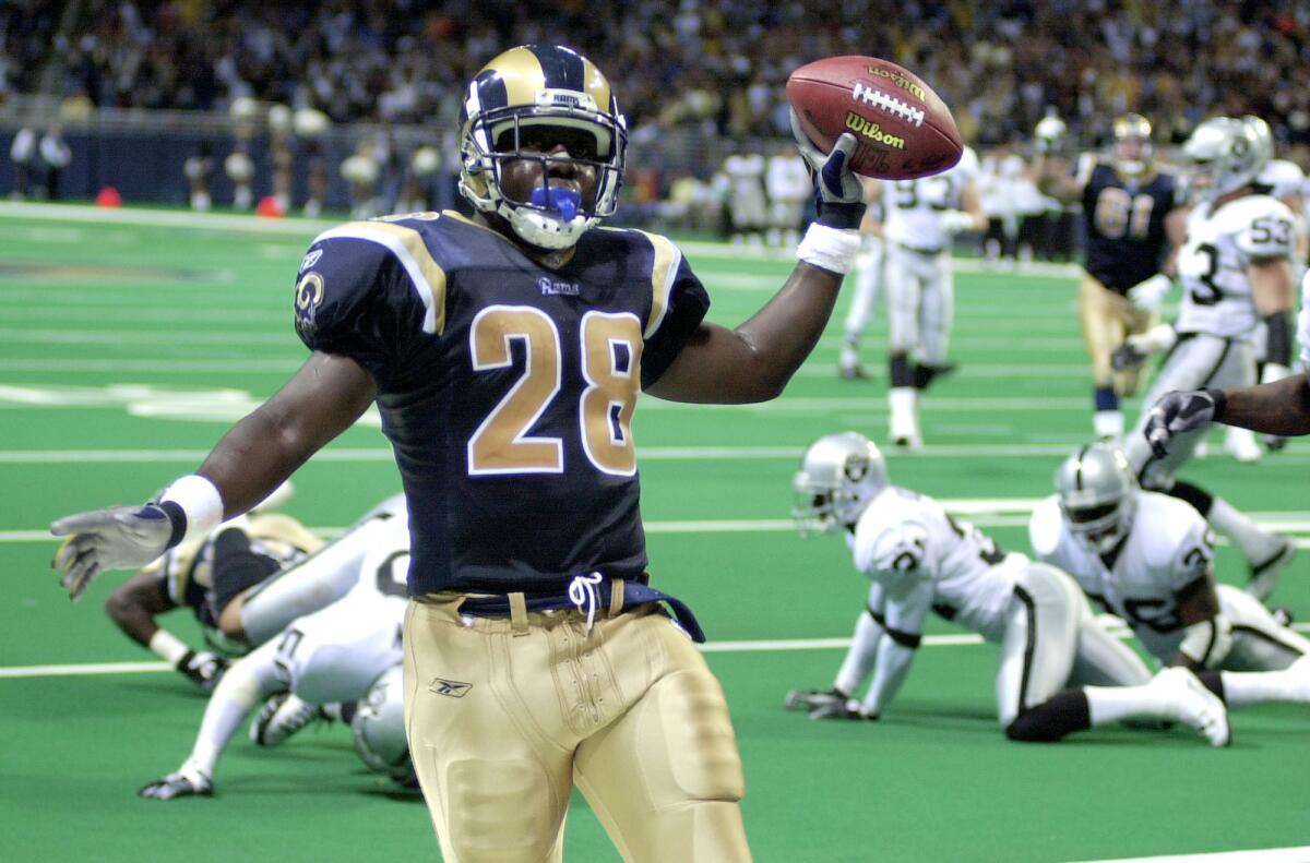 Former St. Louis Rams running back Marshall Faulk is one of dozens of present-day NFL employees to file brain injury claims against their former teams in California. Faulk works as an analyst for the NFL Network.