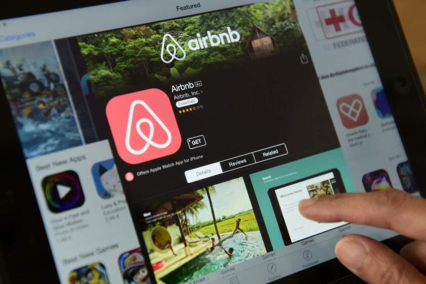 (FILES) This file photo taken on April 28, 2016 shows a woman browsing the site of US home sharing giant Airbnb on a tablet in Berlin. Airbnb is in talks to secure a new round of investment that would value the company at around $30 billion, the New York Times reported on June 29, 2016. If it succeeds in securing the new funds, the short-term home rental company will have tripled its valuation in two years, the Times said citing anonymous sources. / AFP PHOTO / John MACDOUGALLJOHN MACDOUGALL/AFP/Getty Images ** OUTS - ELSENT, FPG, CM - OUTS * NM, PH, VA if sourced by CT, LA or MoD **