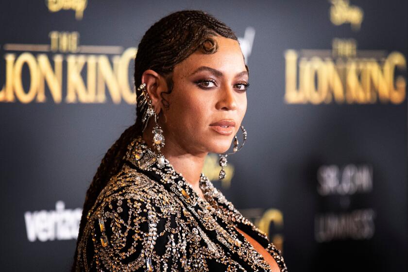 Mandatory Credit: Photo by ETIENNE LAURENT/EPA-EFE/REX (10331334f) Beyonce poses for photographers on the red carpet prior to the world premiere of 'The Lion King' at the Dolby Theater in Hollywood, California, USA, 09 July 2019. The film will be released in US theaters on 19 July. The Lion King World Premiere - Arrivals, Hollywood, USA - 09 Jul 2019 ** Usable by LA, CT and MoD ONLY **