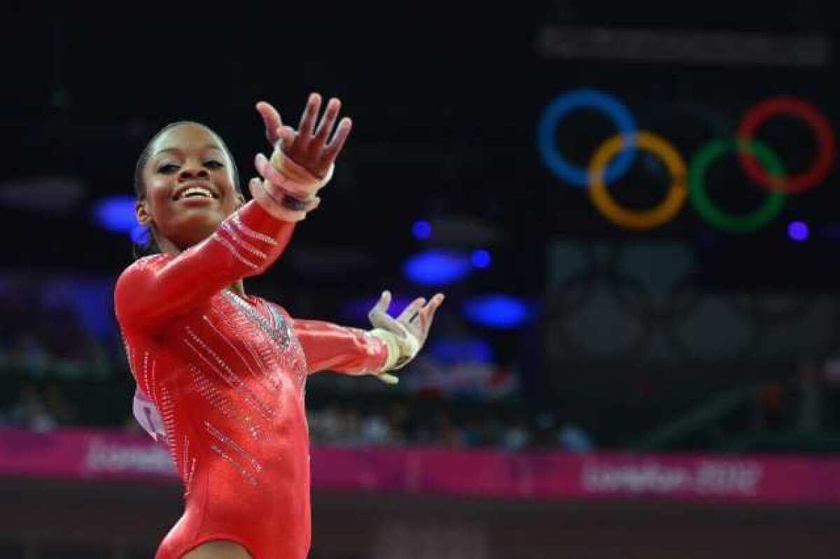 After the vault and uneven bars, the United States' Gabrielle Douglas had a score of 31.699, putting her in first halfway through the women's gymnastics all-around competition.