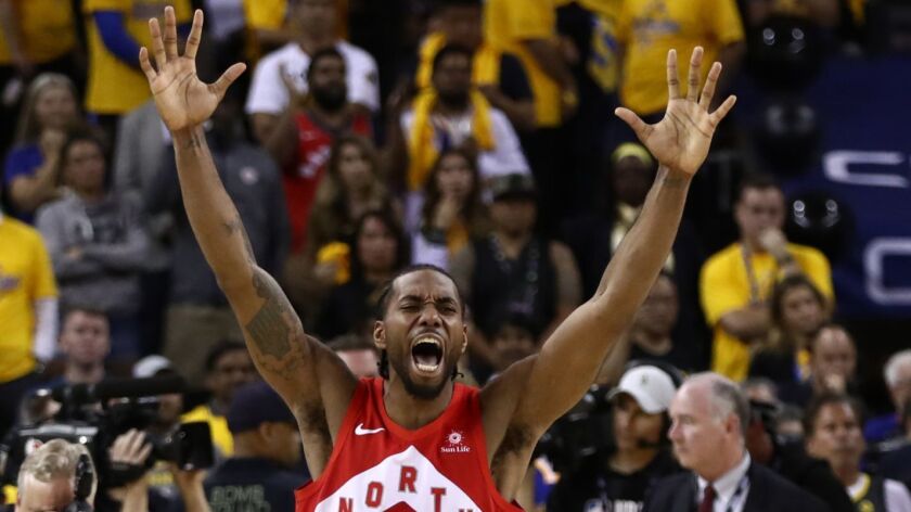 Kawhi Leonard celebrates after the Toronto Raptors clinch their first NBA title with a Game 6 win over the Golden State Warriors on June 13 in Oakland.