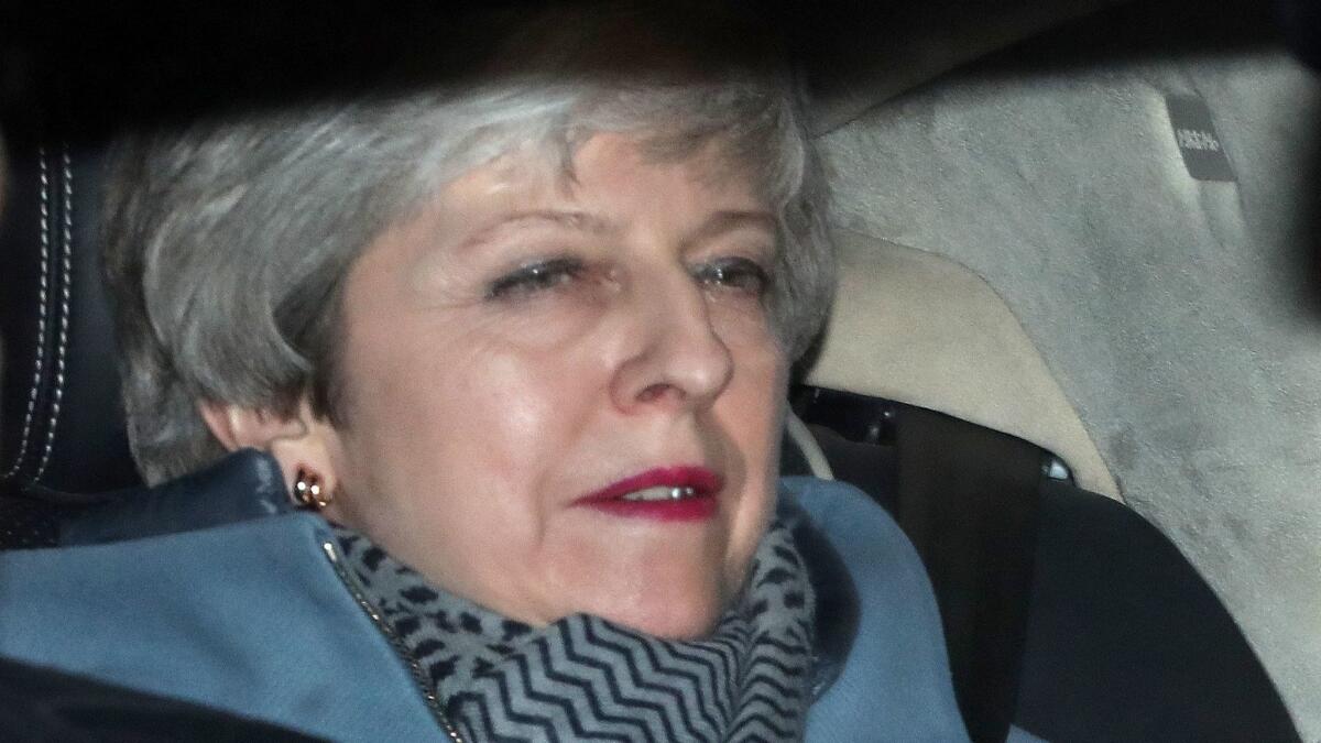 British Prime Minister Theresa May departs the Houses of Parliament in London on March 27, 2019.
