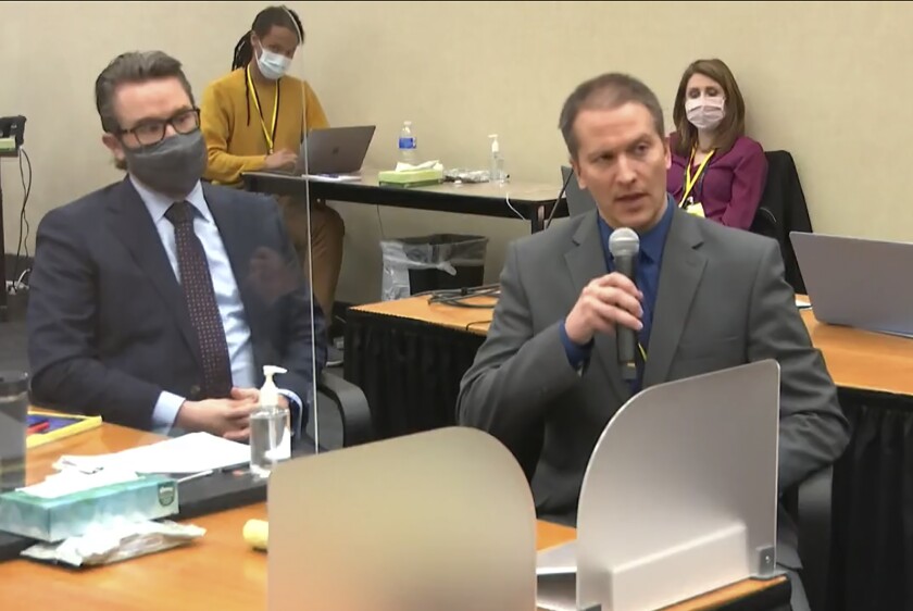 In this image from video, defense attorney Eric Nelson, left, and defendant, former Minneapolis police officer Derek Chauvin address Hennepin County Judge Peter Cahill during motions before the court Thursday, April 15, 2021, in the trial of Chauvin, at the Hennepin County Courthouse in Minneapolis. Chauvin is charged in the May 25, 2020 death of George Floyd. Chauvin told the judge he will not testify on his own behalf. (Court TV via AP, Pool)