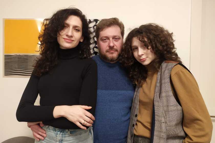 The Tregubov family in Tel Aviv, Israel, days after fleeing Ukraine. From left: Asya, 14, and her parents Ilya and Yuliia.