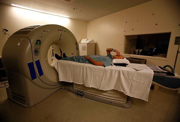 Receiving a CT scan