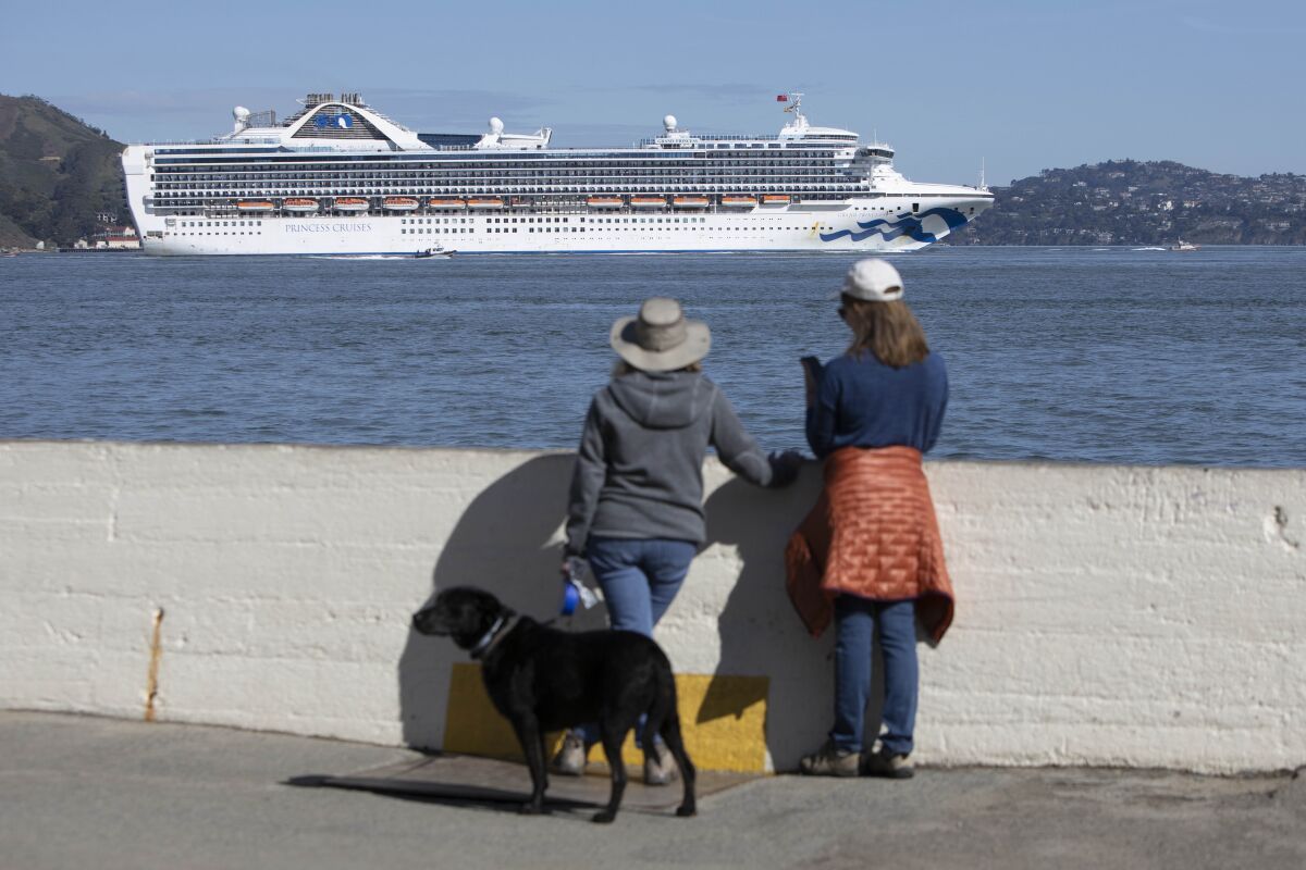 The Grand Princess cruise ship sails into San Francisco Bay to dock at the Port of Oakland. Some of the more than 3,000 people onboard are infected with the new coronavirus.