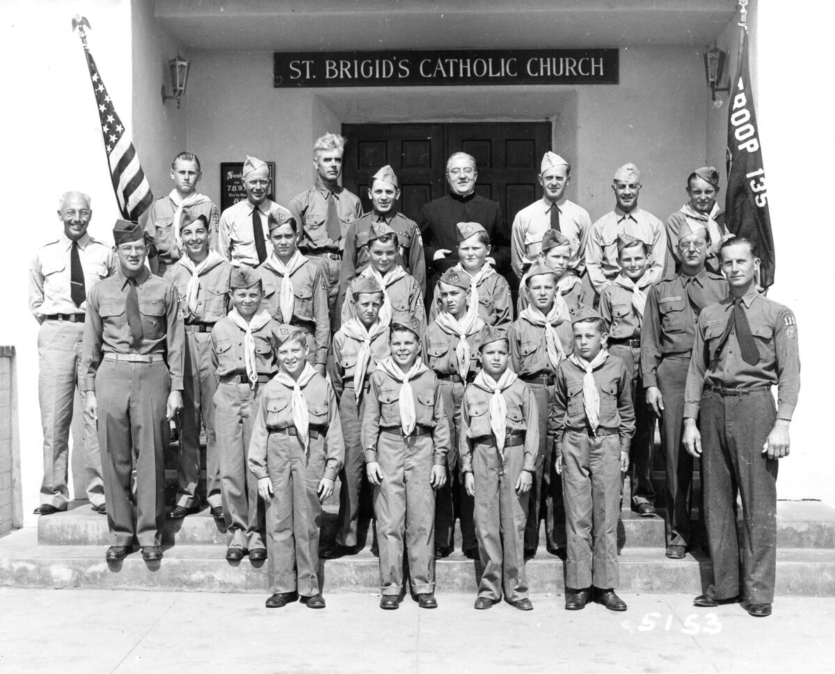 An early group shot of Troop 135 taken on the steps of St. Brigid Church by Howard Rozelle. 