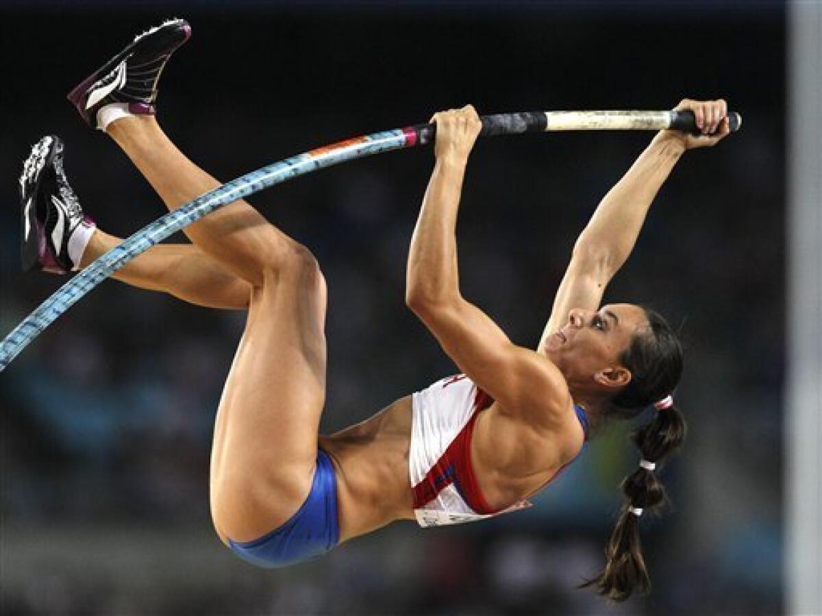 Russia's Yelena Isinbayeva makes an attempt in the Women's Pole Vault final at the World Athletics Championships in Daegu, South Korea, Tuesday, Aug. 30, 2011. (AP Photo/Kin Cheung)