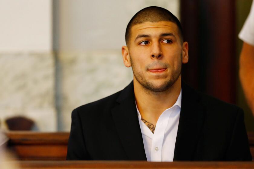 FILE - APRIL 19, 2017: Former New England Patriots player Aaron Hernandez has been found dead in his cell in Massachusetts, where he was serving a life term. NORTH ATTLEBORO, MA - AUGUST 22: Aaron Hernandez sits in the courtroom of the Attleboro District Court during his hearing on August 22, 2013 in North Attleboro, Massachusetts. Former New England Patriot Aaron Hernandez has been indicted on a first-degree murder charge for the death of Odin Lloyd. (Photo by Jared Wickerham/Getty Images) ** OUTS - ELSENT, FPG, CM - OUTS * NM, PH, VA if sourced by CT, LA or MoD **