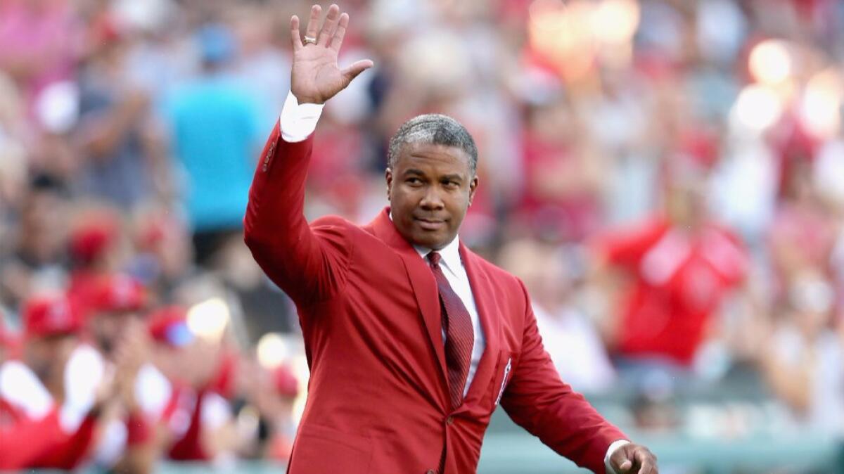 Former Angels outfielder Garret Anderson waves to crowd during his induction to the Angels Hall of Fame on Aug. 20.