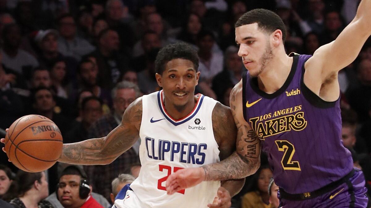 Clippers guard Lou Williams drives to the basket against Lakers guard Lonzo Ball during a game on Dec. 28. Williams could land the NBA's sixth man award on Monday.