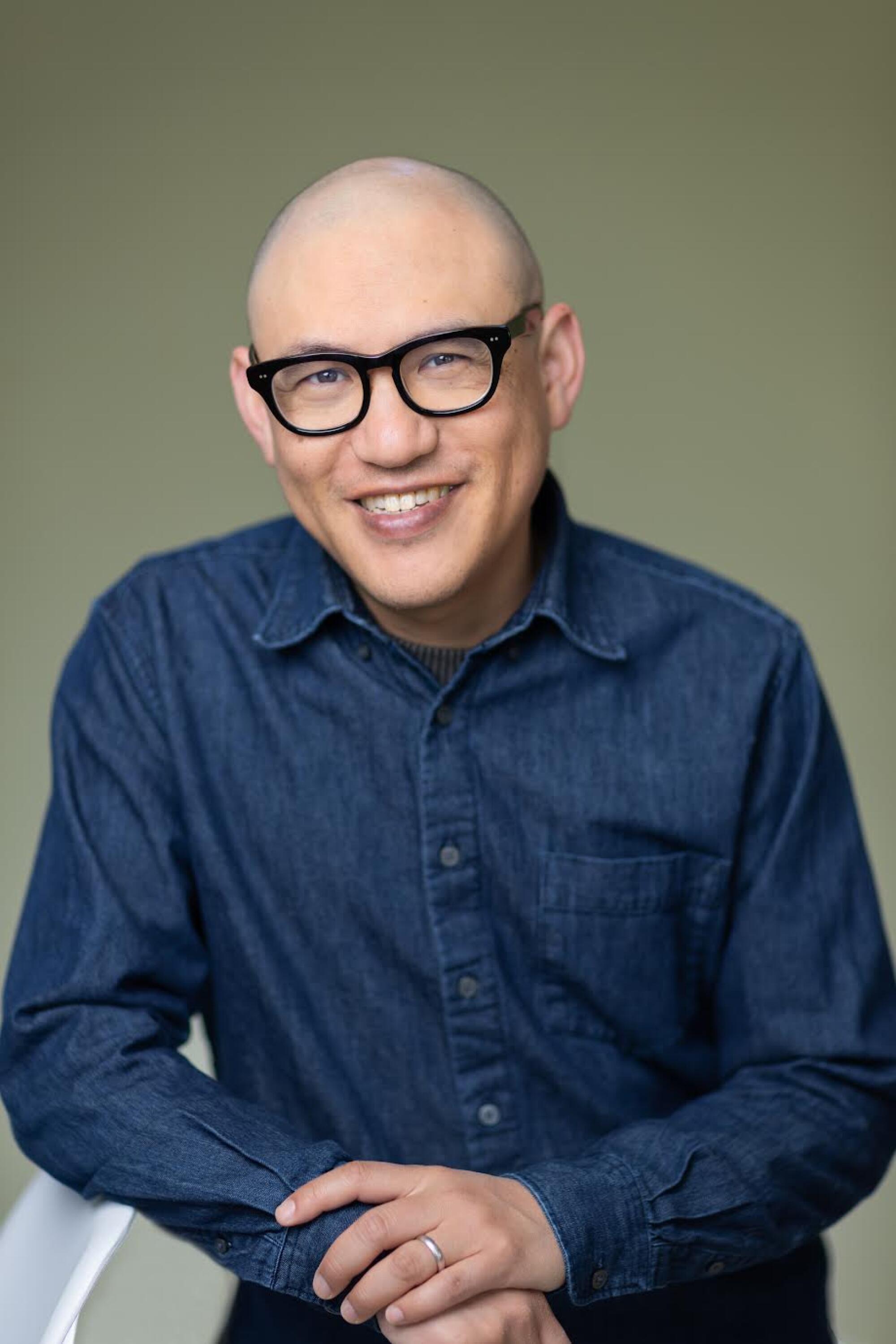 A headshot of stand-up comedian George Chen