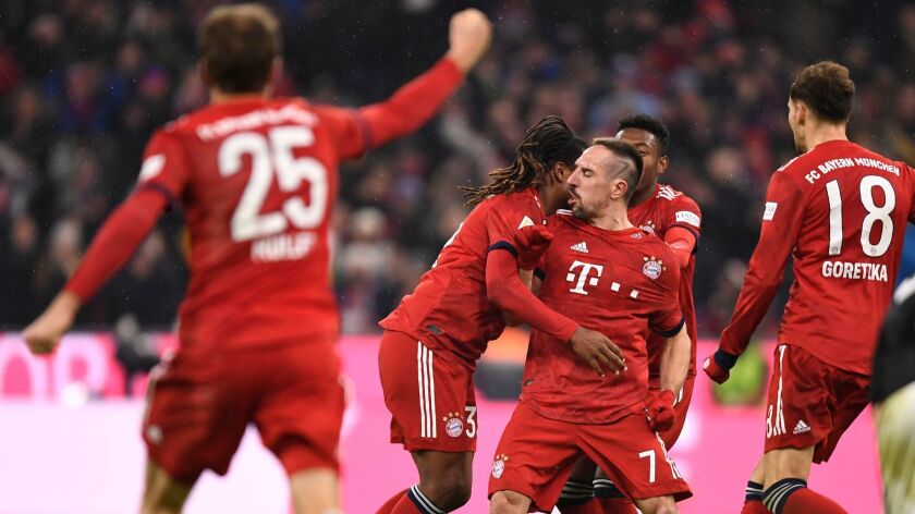 Bayern's Franck Ribery celebrates with teammates after scoring a goal during the Bundesliga match between Bayern Munich and RB Leipzig in Munich, Germany, December 19, 2018.