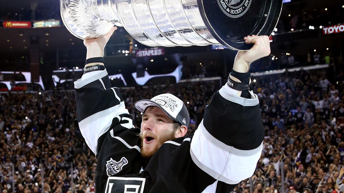 Kings goalie Jonathan Quick celebrates following the team's Stanley Cup victory over the New York Rangers on June 13. Quick underwent wrist surgery Tuesday and is expected to be out for three months.