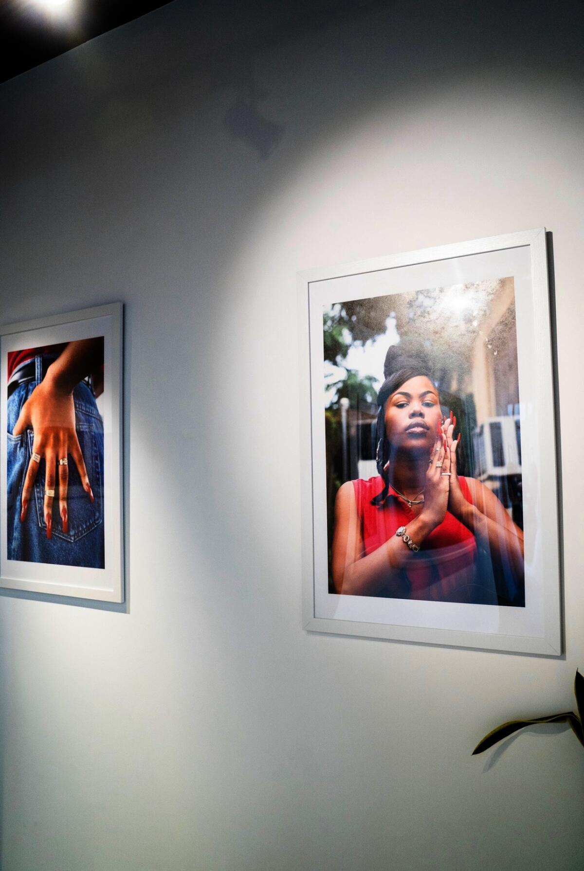 Photographs by Delaney George focus on a Black woman's face and on her hands.