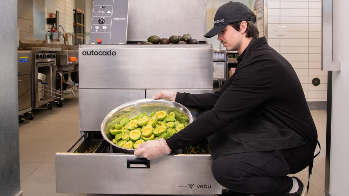 Autocado is a collaborative robot prototype that cuts, cores, and peels avocados.
