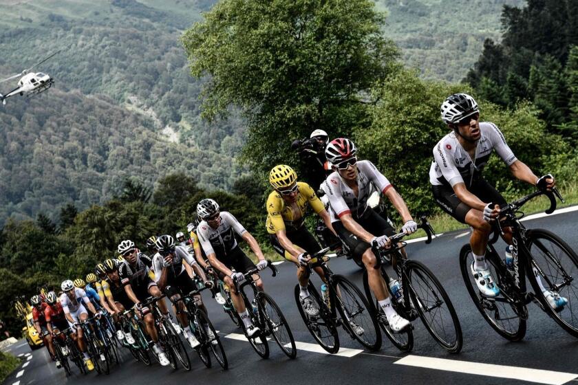 TOPSHOT - Great Britain's Team Sky cycling team teammates, with Great Britain's Geraint Thomas (3rdR), wearing the overall leader's yellow jersey, ascend with the pack the Col du Tourmalet pass during the 19th stage of the 105th edition of the Tour de France cycling race, on July 27, 2018 between Lourdes and Laruns, southwestern France. / AFP PHOTO / Philippe LOPEZPHILIPPE LOPEZ/AFP/Getty Images ** OUTS - ELSENT, FPG, CM - OUTS * NM, PH, VA if sourced by CT, LA or MoD **