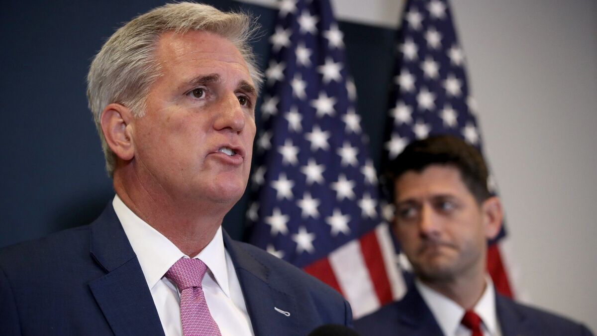 House Majority Leader Kevin McCarthy speaks during a news conference with House Speaker Paul D. Ryan on Sept. 26 in Washington.