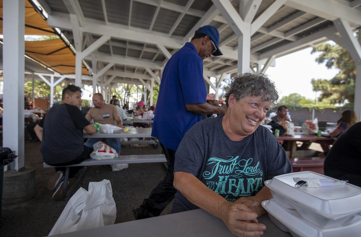 Starla Acosta, 65, has lunch at Mary's Kitchen in Orange on  July 13.