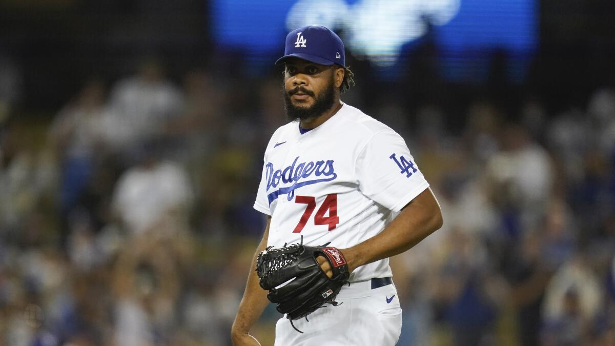 Los Angeles Dodgers relief pitcher Kenley Jansen (74) stands on the mound.