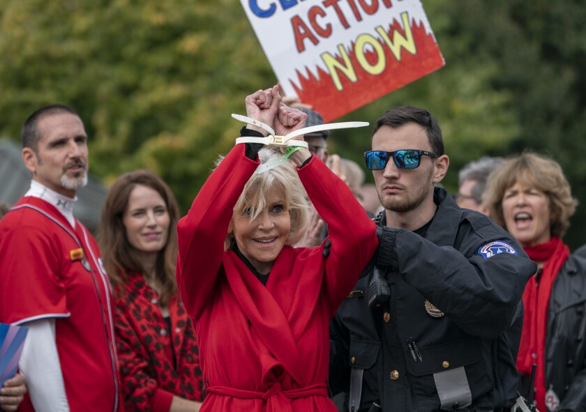 Jane Fonda and her red coat arrested again in climate protest - Los Angeles Times