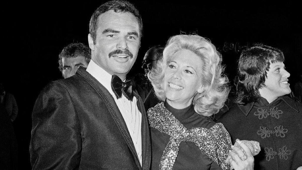 Burt Reynolds with actress Dinah Shore in November 1971 in Los Angeles.