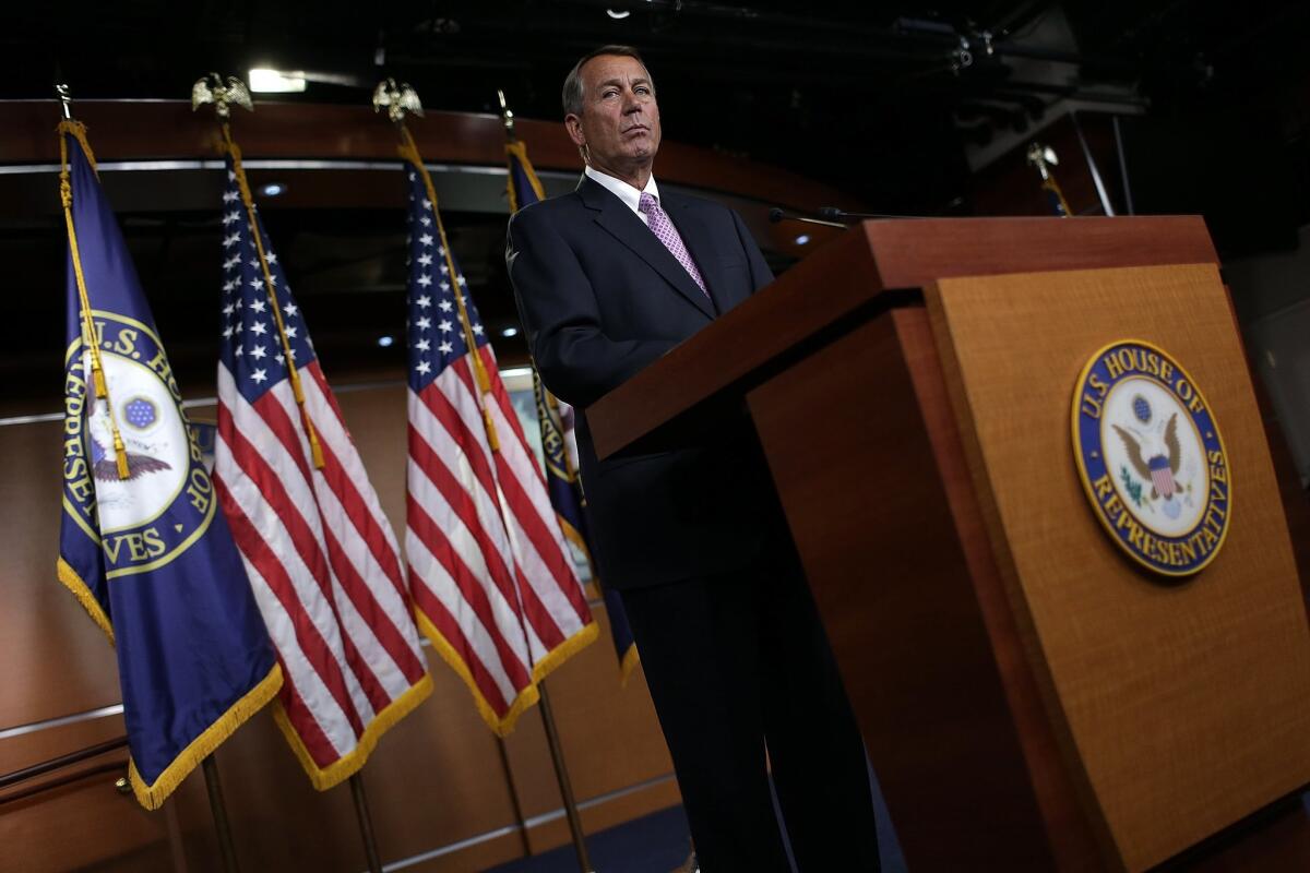 Speaker of the House John Boehner answers questions during his weekly news conference on Thursday in Washington.