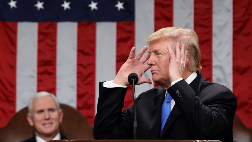 President Trump delivers the State of the Union address in the chamber of the U.S. House of Representatives.