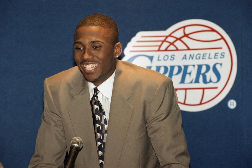 Lorenzen Wright, a 6-foot-10 sophomore forward from Memphis State, the seventh pick in the 1996 NBA draft by the Los Angeles Clippers, speaks to the news media, Thursday, June 27, 1996 in Los Angeles. (AP Photo/Nick Ut)