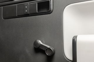 A manual window crank comes standard in the Slate truck.