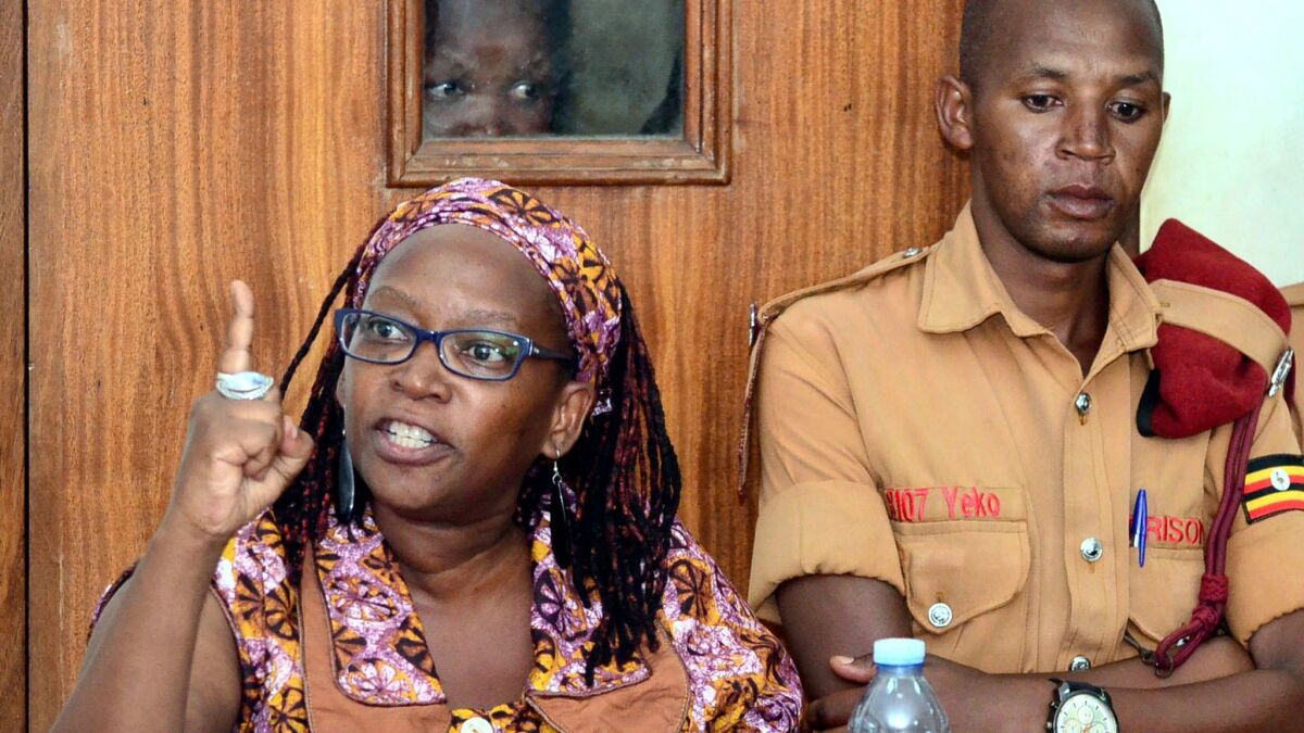 Ugandan academic and activist Stella Nyanzi appears in court in April, charged with insulting the president and his wife in a Facebook post. (Associated Press)