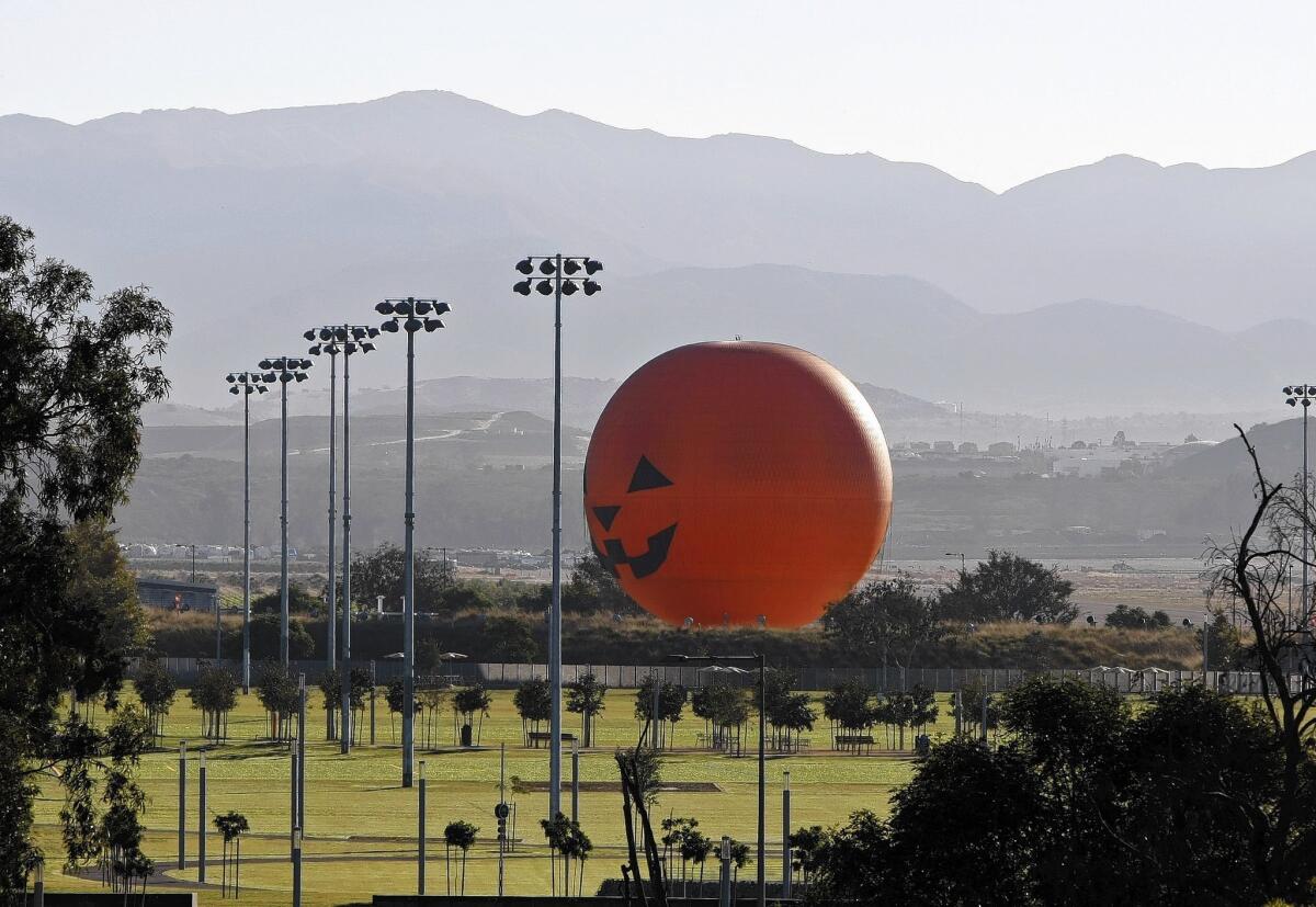 The 118-foot-high Great Park Balloon observation ride sits near athletic fields at the Great Park in Irvine. The balloon has been the centerpiece of the struggling park.