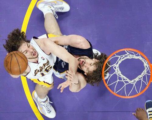 Brother against brother: Pau, at left, shoots over his brother, Memphis Grizzlies center Marc Gasol, during the first half of an April 12 game at Staples Center. Related: Photo gallery: The personal side of Pau Gasol